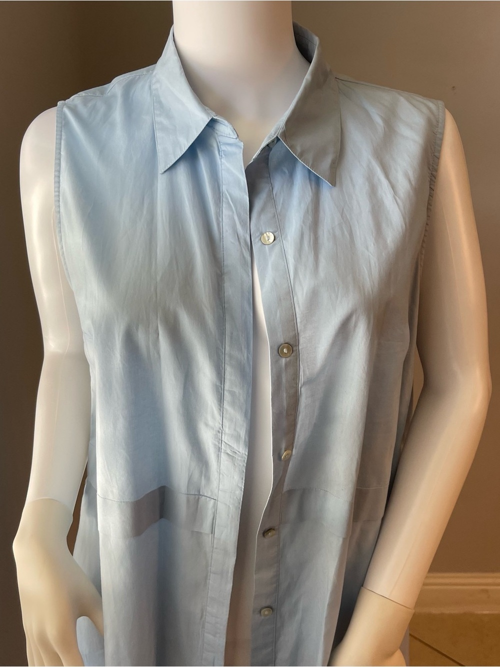 This is a light blue Forever 21 sleeveless top size medium
Like new condition - Picture 9 of 11